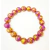 PULSEIRA BOLAS ROXAS MESCLADAS COM DOURADO na internet