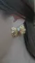Conjunto colar e brinco de laço com detalhes cravejados no centro banhados em ouro 18K CONJ01 na internet
