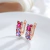 Aretes rosa-lila en internet