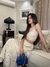 Conjunto Cropeed e Saia na internet