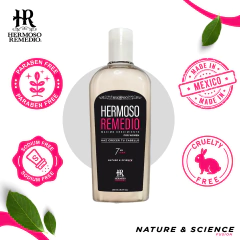 Botella de shampoo Hermoso Remedio para crecimiento anticaída y reparación capilar en mujeres, libre de parabenos y sodio, con ingredientes como biotina y colágeno.
