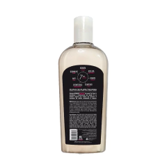 Vista trasera de botella de shampoo hermoso remedio para crecimiento anticaída y reparación capilar para mujer, con ingredientes como biotina, queratina y colágeno, en presentación de 250ml.