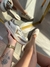 Tênis feminino Sandy off white/onça