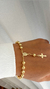 Pulseira Terço Dourado na internet