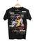 Camiseta preta com estampa do Led Zeppelin, apresentando um design vibrante e a bandeira dos EUA ao fundo.