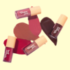 Frascos de Tint Cream Choco Fun da Fenzza, com cores variadas sobre um fundo claro.