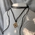 CHOKER NUDO DE BRUJA