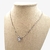 Choker em malha brilhante com coração cravejado em zircônia banhada a ródio branco na internet