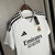 Camisa do Real Madrid I 24/25, modelo torcedor da Adidas, na cor branca com detalhes em preto.Camisa Real Madrid I 24/25 - Torcedor Adidas Masculina - Branca com detalhes em preto