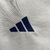 Imagem do JAQUETA CORTA VENTO REAL MADRID 2024/25 ADIDAS MASCULINA BRANCA E AMARELO