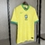 Camisa amarela da seleção brasileira, modelo I Home 24/25, fabricada pela Nike, com detalhes em verde e logo da CBF.