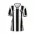 Camisa feminina do Botafogo I Reebok 2024 com listras pretas e brancas e logo do clube.