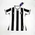 Camisa feminina do Botafogo I Reebok 2024 com listras pretas e brancas e logo do clube.