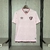 Camisa rosa do Fluminense, modelo 2024, fabricada pela Umbro, com logo e detalhes em marrom.