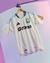 Camisa branca do Aston Villa, modelo away 24/25, fabricada pela Adidas, com logo da Betano e emblema do time.