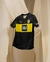 Camisa preta e amarela do Borussia Dortmund II, modelo away 24/25 da Puma, com logotipo do time e patrocínio em destaque.