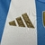 Camisa masculina da Seleção Argentina, modelo I 24/25, nas cores azul e branco, com detalhes em dourado e patch da FIFA.Camisa Seleção Argentina I 24/25 Azul e Branco + Patch - Adidas - Masculino Torcedor