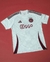 Camisa branca do Ajax 2024/25, com detalhes em marrom e logo da Adidas.