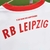 Camisa branca do RB Leipzig 24/25 com detalhes em vermelho e logotipo da Puma.