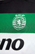 Camisa do Sporting CP 2024/25, verde e branca, com listras e logo da Nike.