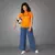 Camisa Real Madrid 2024/25 - Torcedor Feminina - Laranja - loja online