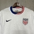 Camisa branca do time dos Estados Unidos, modelo home 2024/25, da Nike, para torcedores masculinos, com detalhes em azul e vermelho.