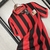 Camisa Milan 2025/26 125 anos Edição Especial - Torcedor Masculina - Preta e Vermelha - loja online