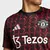 Camisa Manchester United Aquecimento 2024/25 - Pré-Jogo Masculina - Preta Vermelha na internet