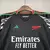 Conjunto infantil do Arsenal II Away 24/25 da Adidas, na cor preta, com camisa e calção.