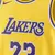 Camisa regata masculina do Los Angeles Lakers, modelo LeBron James nº 23, nas cores amarelo e roxo.