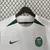 Camisa branca do Sporting 2024/25, com detalhes em verde e logo da Nike.