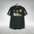 Camisa preta do Botafogo, modelo Away 24/25, com detalhes em dourado e logotipo do time.
