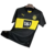Camisa preta e amarela do Borussia Dortmund II, modelo away 24/25 da Puma, com logotipo do time e patrocínio em destaque.