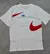 CAMISETA NIKE BRANCA COM ESTAMPA VERMELHA na internet