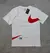 CAMISETA NIKE BRANCA COM ESTAMPA VERMELHA - comprar online