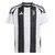 Camisa infantil da Juventus 2024/25, branca com listras pretas e detalhes em preto.