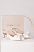 Sandália slingback em verniz branco - comprar online