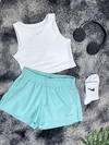 Top crop Nike + pantaloneta Run