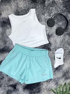 Top crop Nike + pantaloneta Run