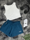 Top crop Nike + pantaloneta Run