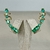 Ear cuff com zircônias verdes