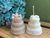 LEMBRANCINHA_VELA_FORMATO_DE_BOLO_DE_CASAMENTO