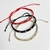 Pulsera tejida