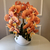 Arranjo de Orquídea Ocre Outono Com Vaso de Vidro Branco Equibana