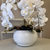Arranjo de Orquídea Branco Puro Com Vaso de Vidro Branco Equibana na internet