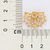 Brinco meia flor de lótus banhado a ouro 18k com zircônias (52738006) na internet