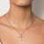 Pingente cruz banhado a ouro 18k com zircônias e cristal (54291639) - Estilo Dixe | Semijoias Rommanel