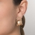 Brinco meia argola com esferas banhado a ouro 18k (52736400) - Estilo Dixe | Semijoias Rommanel