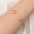 Bracelete banhado a ouro 18k com esferas (55216800) na internet