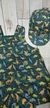 "Jardineira Max Conforto + boné: Estilo e Bem-Estar para o Seu Bebê!" " Dinos (fundo verde ) na internet